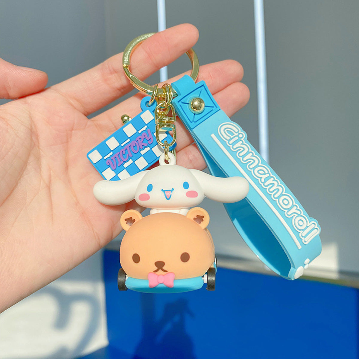 Sanrio on Race Car with Rolling Wheel Keychain - HugmieToys