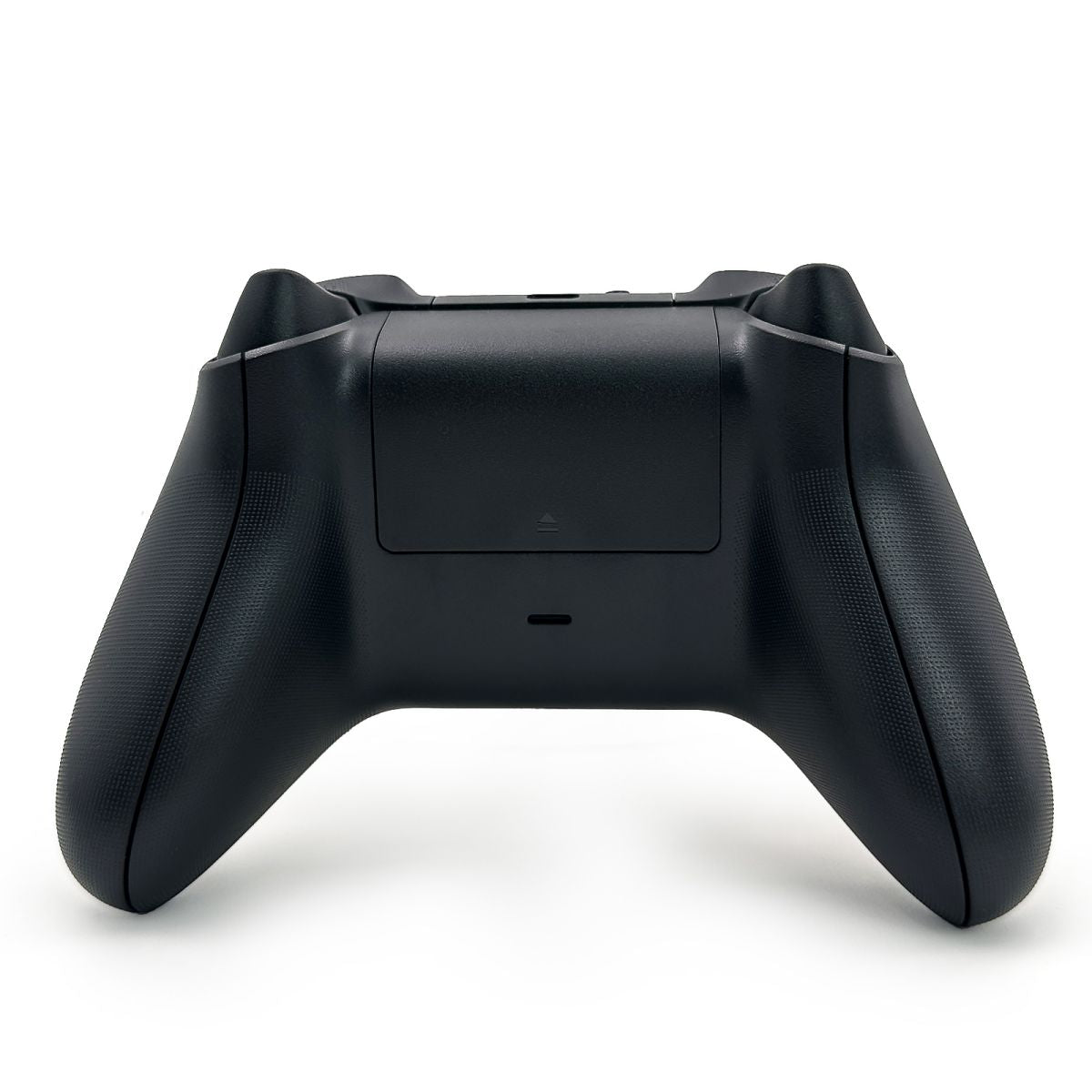 Rear view of the WR007 Xbox Wireless Controller in black, showcasing its textured grip and battery compartment for extended gaming sessions.